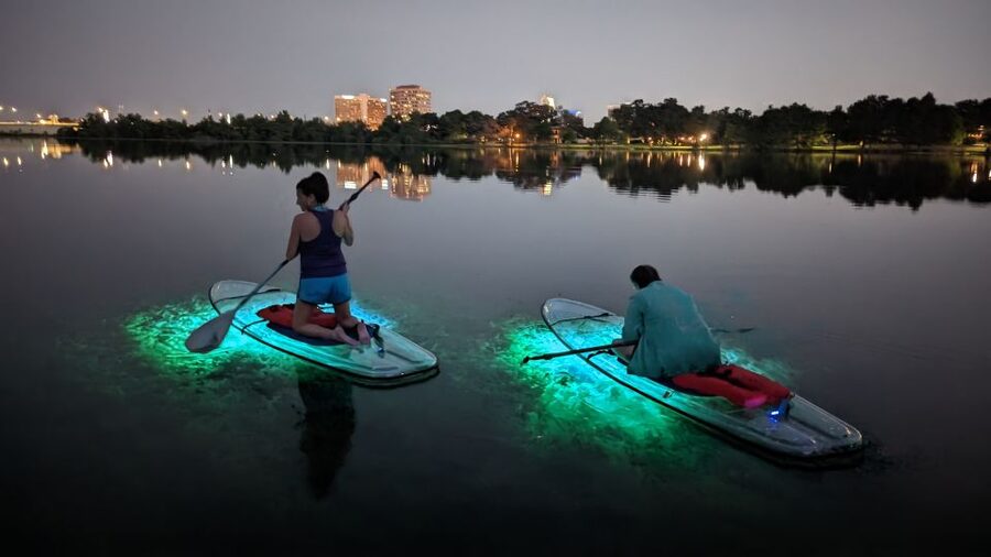 Orlando: LED Night Glow Clear Kayak or Paddleboard Tour - Crossing the front lake with Orlando lights nearby